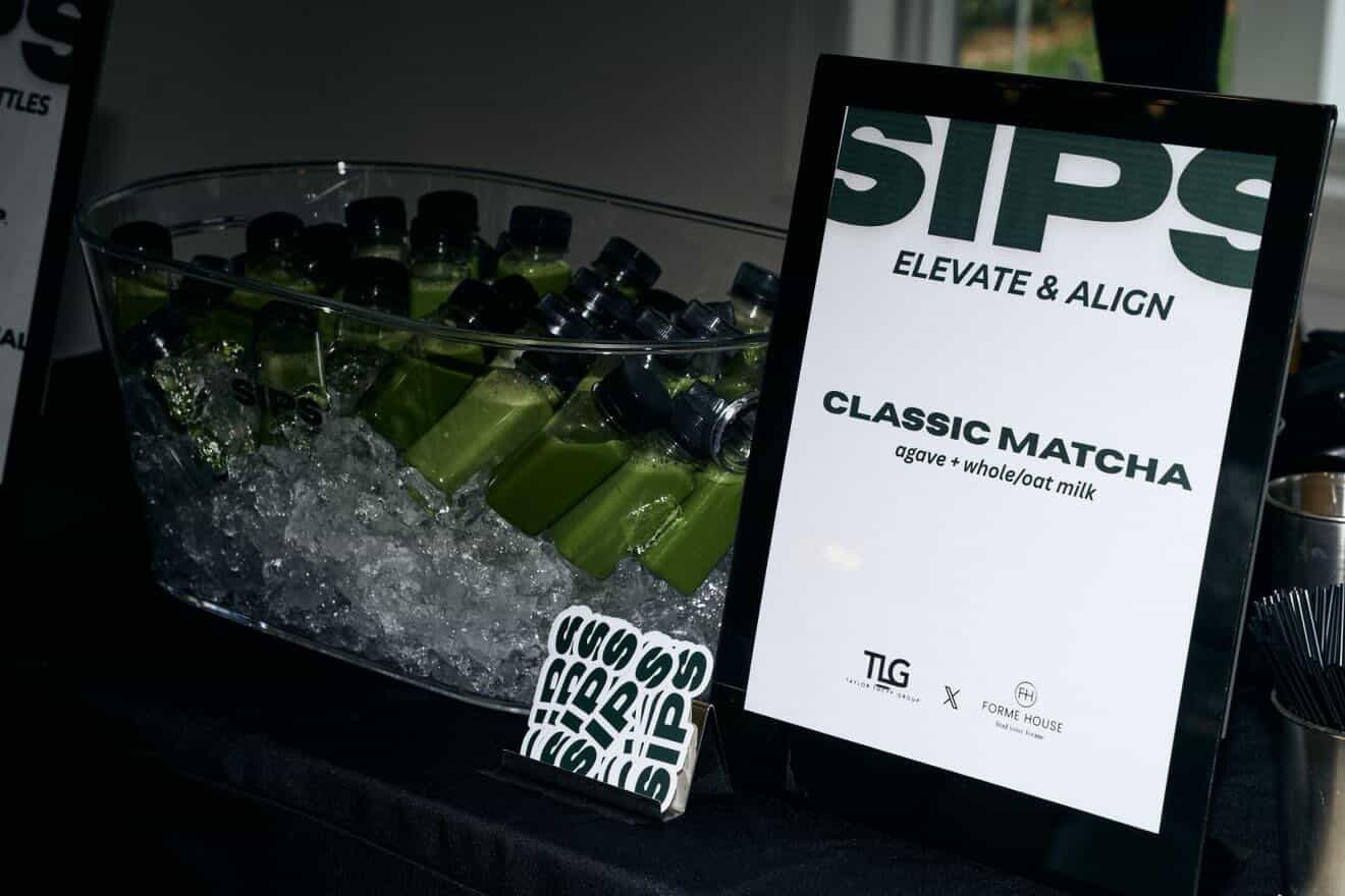 The SIPS matcha bar at a TLG × Forme House event, with SIPS Minis on ice and a Classic Matcha menu sign