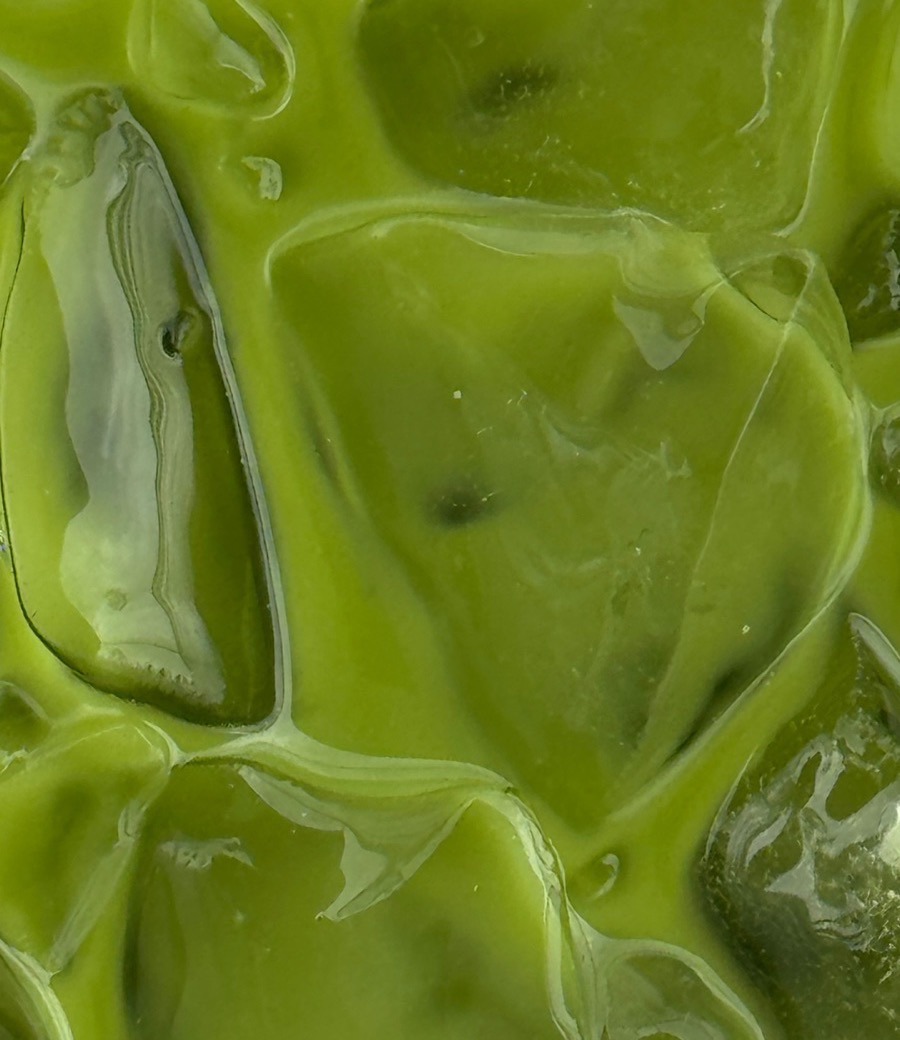 Close-up of SIPS matcha poured over ice